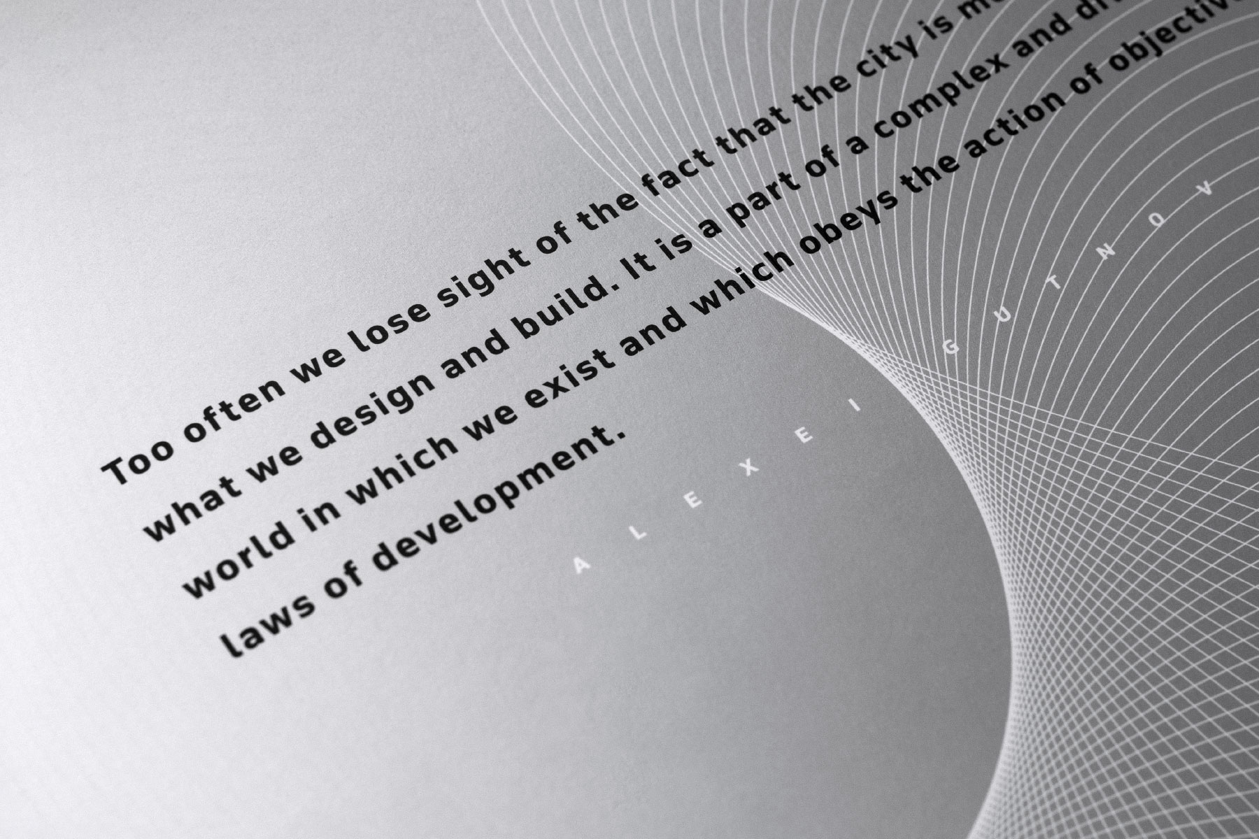 City of the Future book spread showing a quotation infront of a silver background and organic pattern of lines